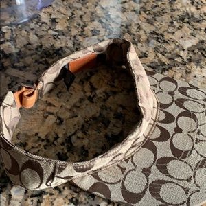 Coach sun visor